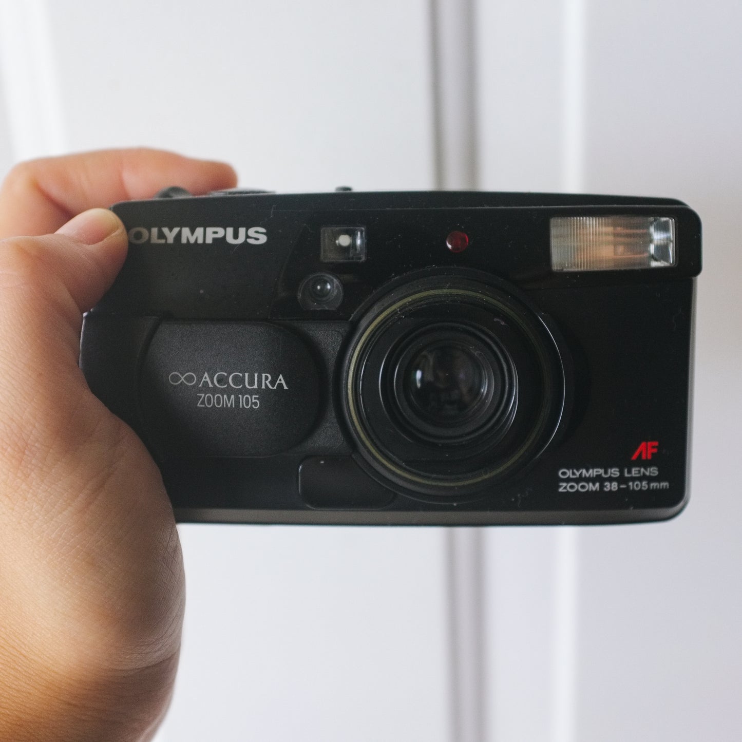 Olympus Infinity Accura Zoom 105 35mm camera